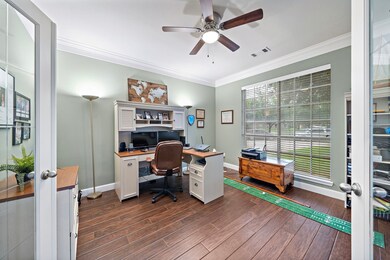 Home Office with french doors for privacy, located off front hallway.