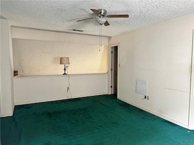Upstairs bedroom with walk in closet, laundry, full bath and linen closet