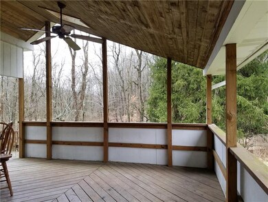 Large covered deck accessible from Kitchen doors.
