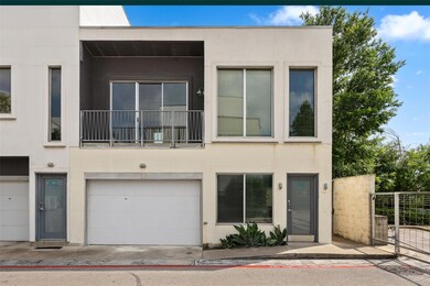 View of front of home featuring stucco siding and
