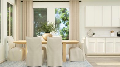 Dining space with light hardwood / wood-style floo