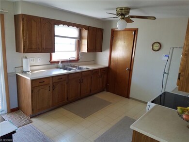 Spacious kitchen offers plenty of counter and cabi