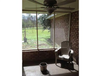 Exterior Back. Covered rear patio off the living r