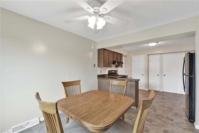 Dining area looking into kitchen