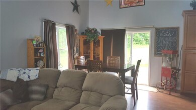Dining, sliding glass door to back deck/pool area