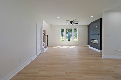 The large window allows for natural light to fill this beautiful room.