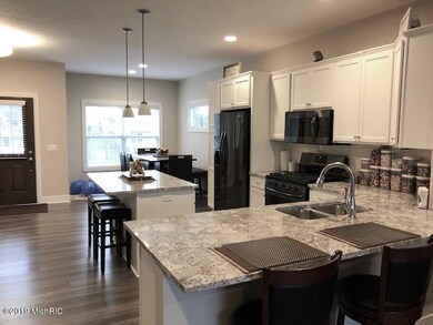 704 Braeside Dr SE unit 70, Byron Center, MI 49315 - photo 4