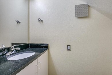 And a convenient downstairs half bath for guests
