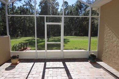 Screened In Patio View with Pavers inside & outside