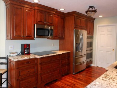 View of the beautiful Cherry Kitchen w/cook top,mi