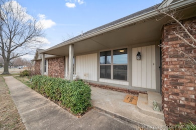 Enjoy a covered front porch where your arriving gu
