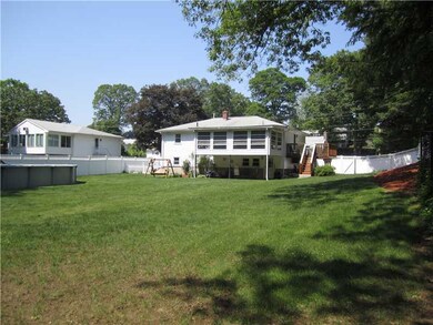 Exterior Back. Approx. 1/2 acre of manicured lawn.