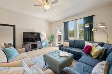 Living room featuring light tile patterned floors