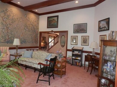 Great room view to hall showcasing the ceiling hei
