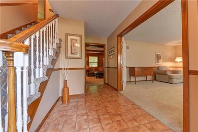 Tiled foyer welcomes you inside this lovely two-st
