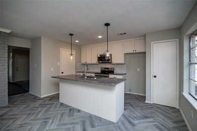 All cabinets, lighting, granite, sink, faucet and 