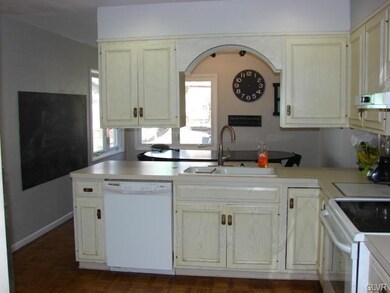 Spacious kitchen with custom cabinets and pullout 