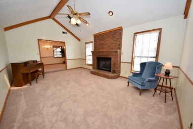 Great Room features Fireplace, Vaulted Ceiling wit