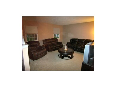 One of two living areas.  Home has replacement win