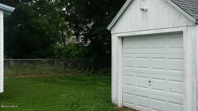 Garage &  Rear Yard View