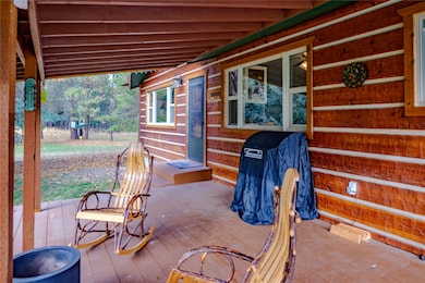 View of patio / terrace with a deck