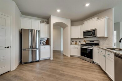 Huge kitchen with giant walk in pantry and gas stove,