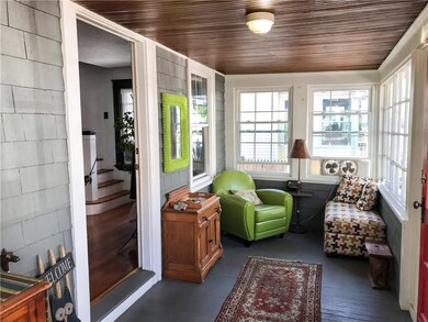 This comfortable front porch greets your guests as