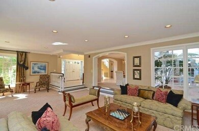The formal living room is perfectly located and sp