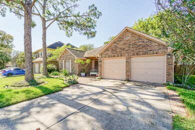 Spacious, double-width driveway providing ample guest parking.