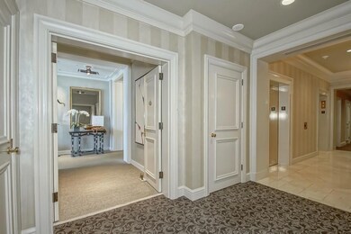 Front entrance to 6G w/ view of elevator foyer