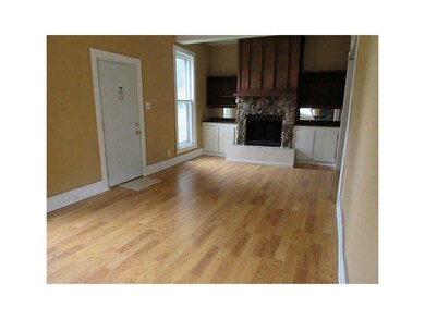 Living Room. Living Room main entrance and fire pl