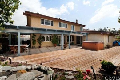 BACKYARD WOOD DECK W/SPA & COVERED PATIO