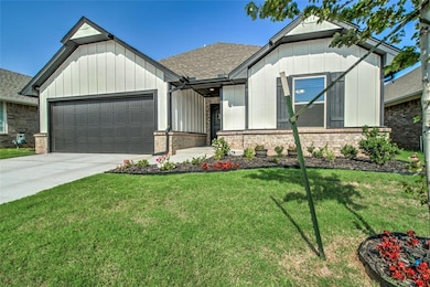 View of front of house featuring a front yard and 
