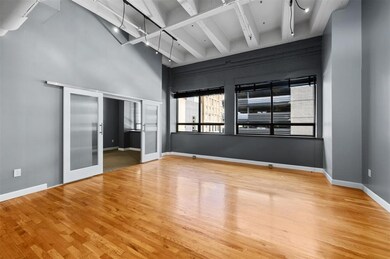 Spacious room with high ceilings and modern indust