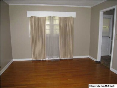 Formal dining room off of kitchen and living