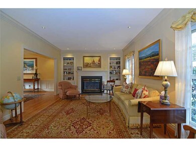 Living Room. Classic hardwood flooring underscores