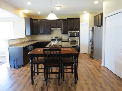 This kitchen features stainless steel appliances, 