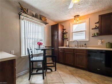 Ceramic floor, new light fixture and Moen goose ne
