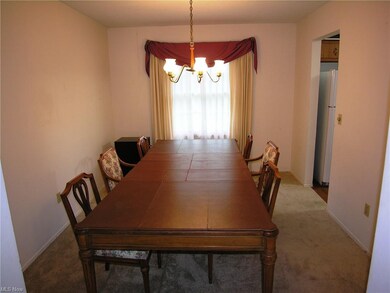 Dining room has seating for eight (8) and corner c