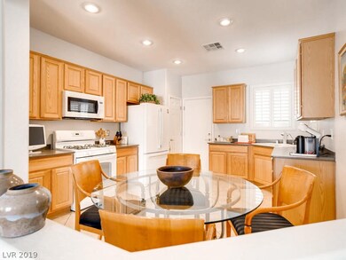Kitchen - Corian Counters, Upgraded Maple Cabinets