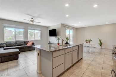 Kitchen with a sink, stainless steel appliances, o