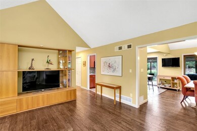 FAMILY ROOM OPENS INTO DINING ROOM AND KITCHEN