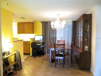 Dining area right off kitchen. The sliders lead to