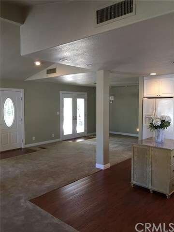 From Kitchen looking at dinning room and front doo