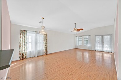 This a combo living & dining room with wood style