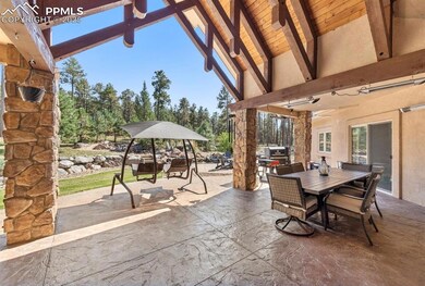 View of patio with outdoor dining space