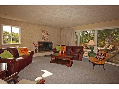 Family Room. Family room with woodburning fireplac