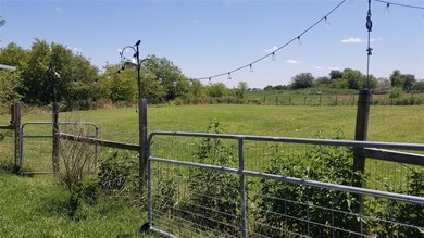 Second gated entrance with culvert.