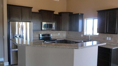 OPEN KITCHEN WITH ISLAND & GRANITE