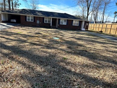 Single story home featuring crawl space, brick sid